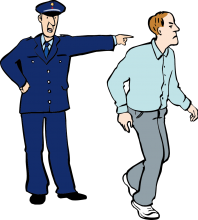 ein Polizist verweist einen Mann von einem Ort